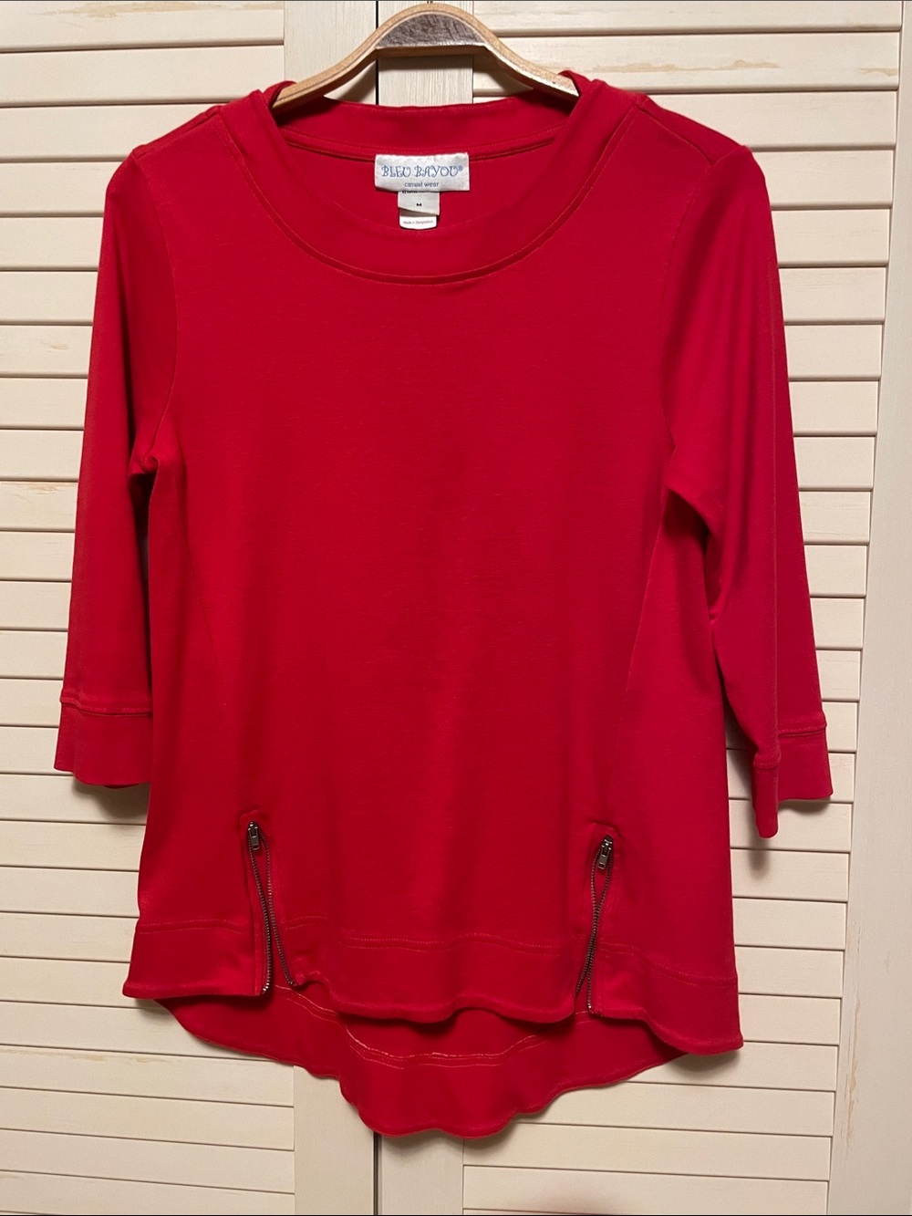 Bleu Bayou Red top with 3/4 Sleeves and Zip-Hem details